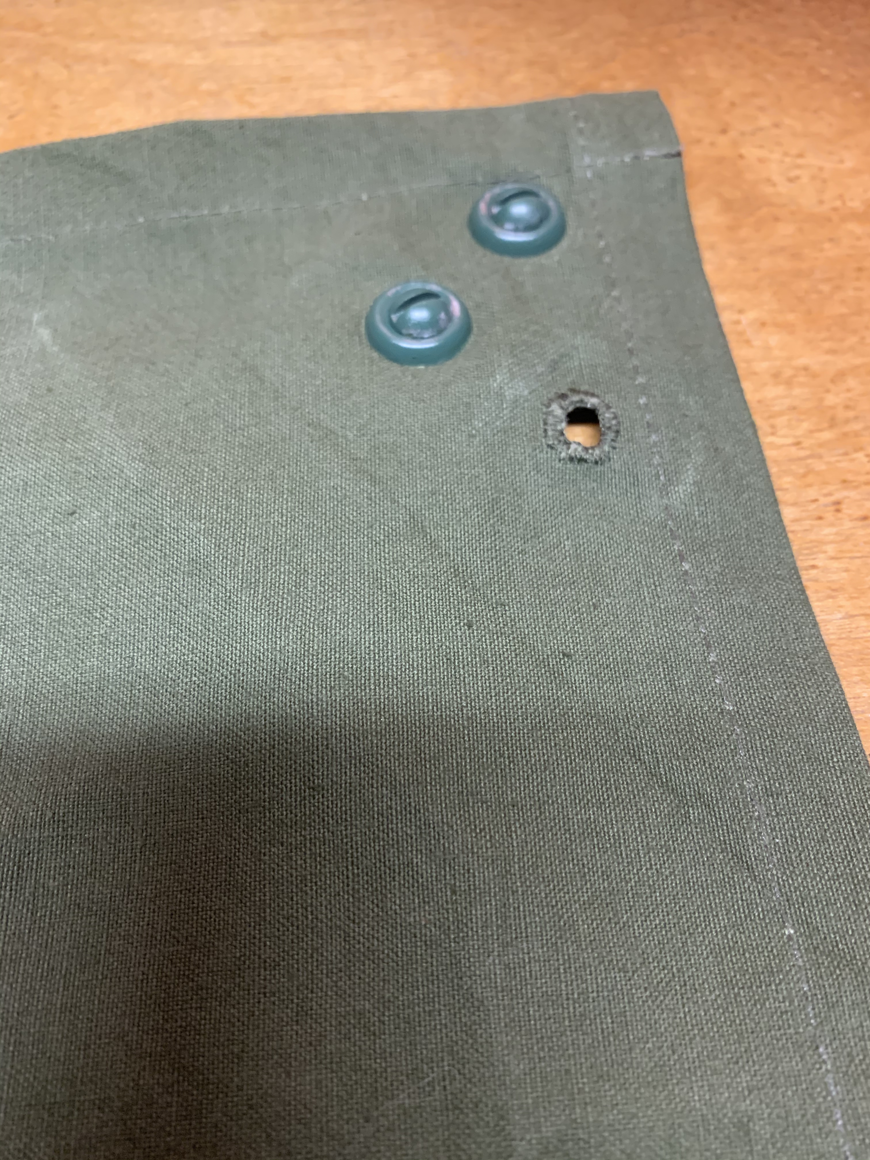 Cape with Reinforced Stitching Around the Hole.jpg