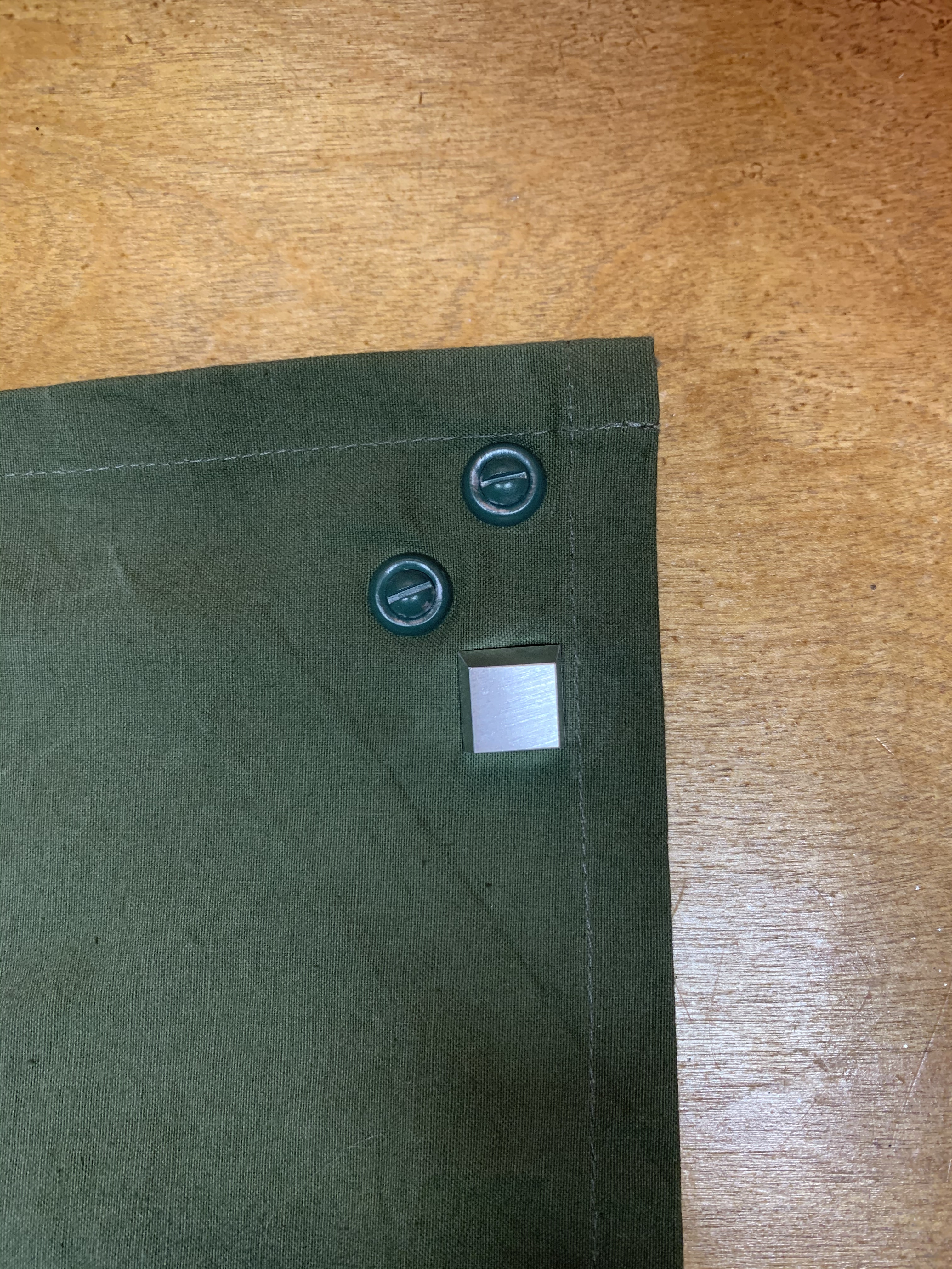Cape with Stud Covering Hole.jpg