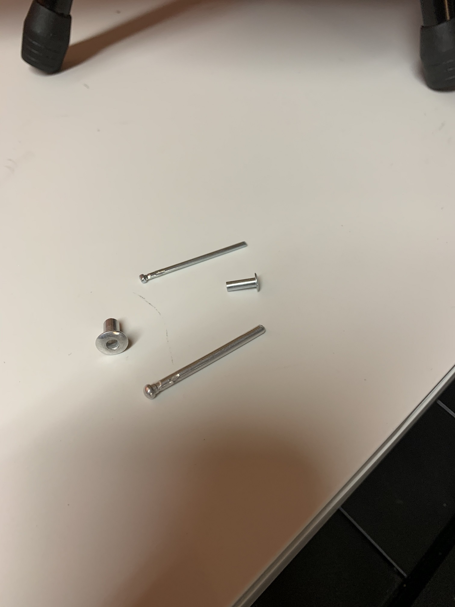 Pins Knocked Out of Rivets.jpg