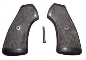 1887–1963
A pair of original military issue grips for the  Webley. Bench mark plus crown & number. Genuine grips  these are wooden.