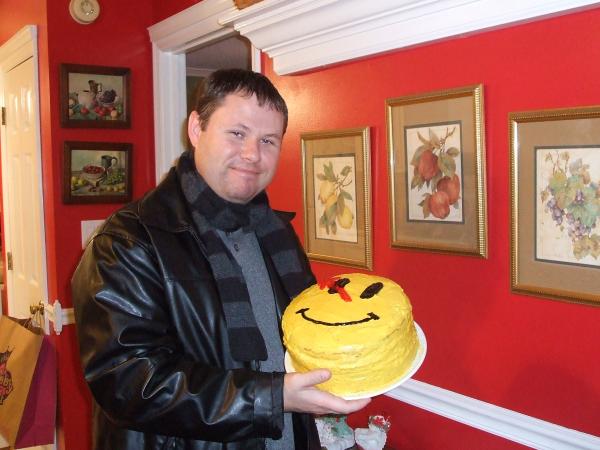 George, my husband, and his Watchmen cake I made him for his birthday.