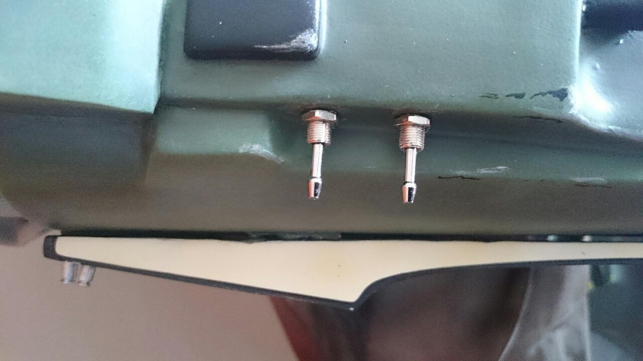 I replaced the cheap resin toggle switches with REAL ones.