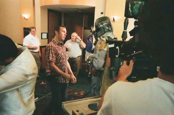 Talking to the Director from Spike TV. we did this take 16 times. I had to blast those two guys in the background while holding a cup of coffee and trying not to spill it.